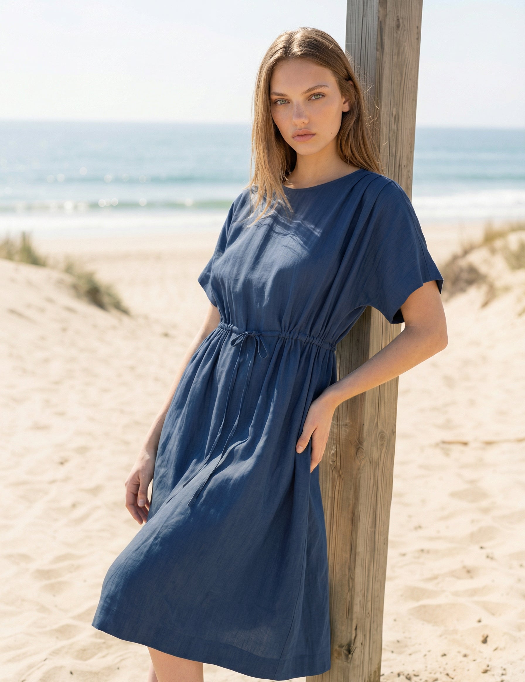 DressMillie_Tencel_darkdenim_handmade_in_germany_Harper_flatlay_beach_97dc6b06-d864-4b16-b4b6-706fca8bc624.webp
