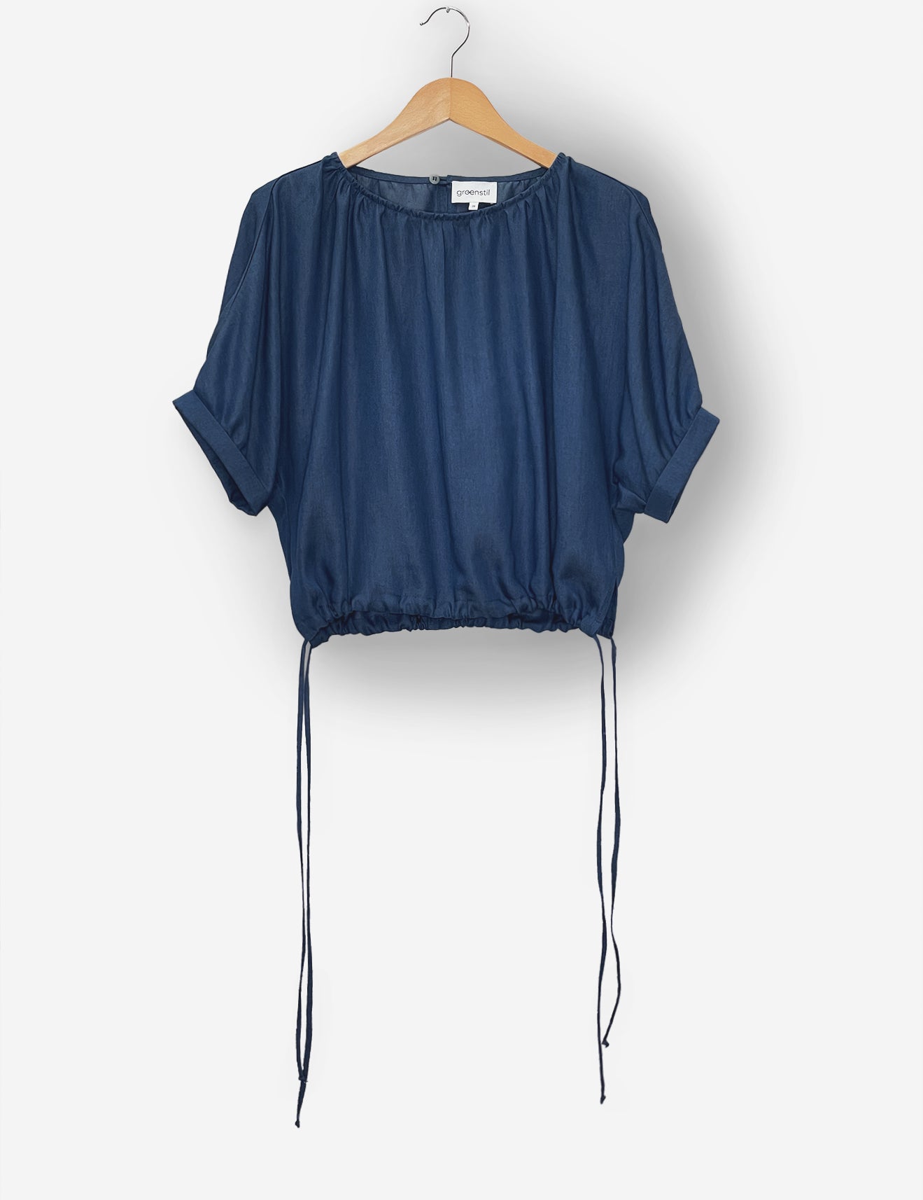 IMG_2516_blouseluzie_blousetopwshortsleevesandbindingathem_tenceldarkdenim_Flatlay.webp
