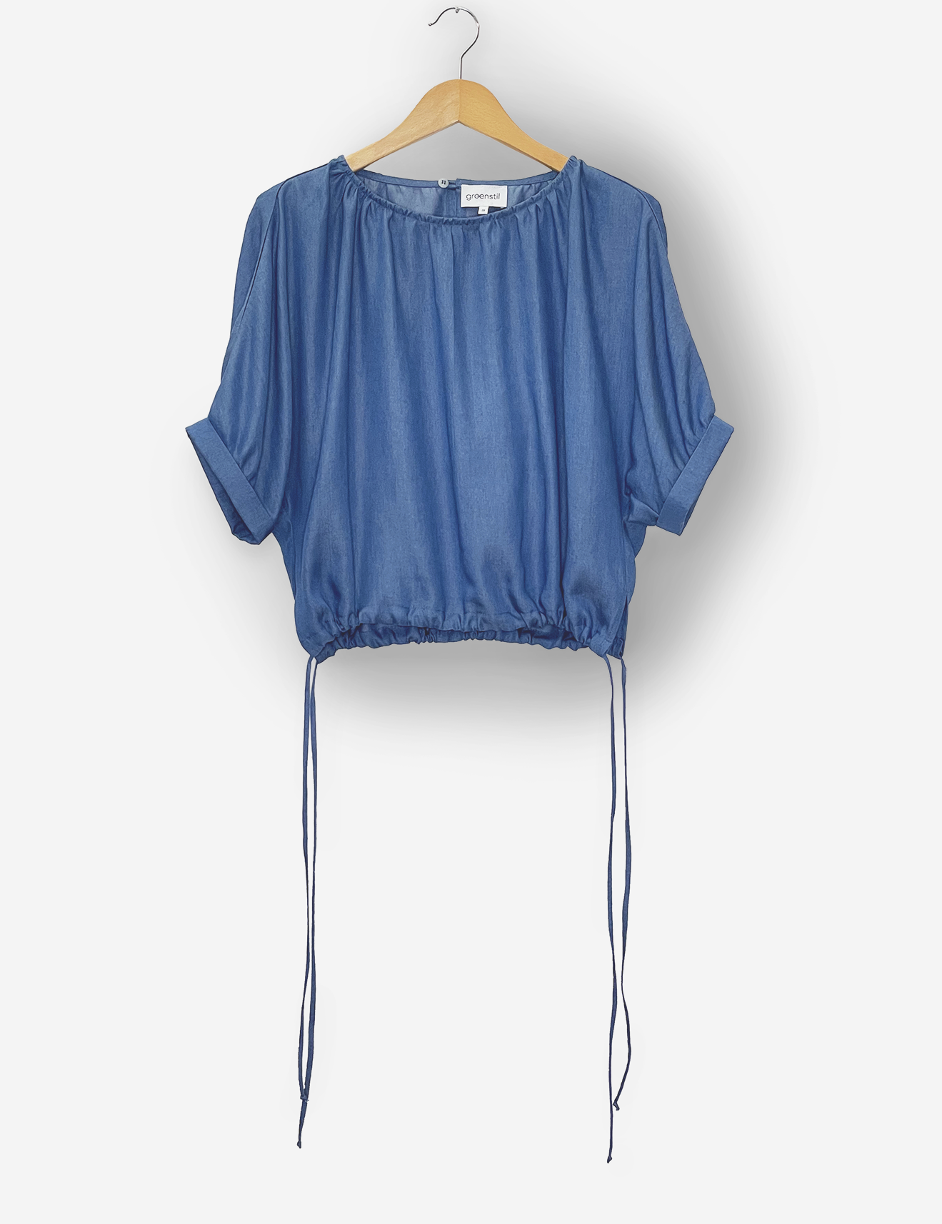 IMG_2516_blouseluzie_blousetopwshortsleevesandbindingathem_tencelmidbluedenim_sustainable_FlatlayKopie.webp